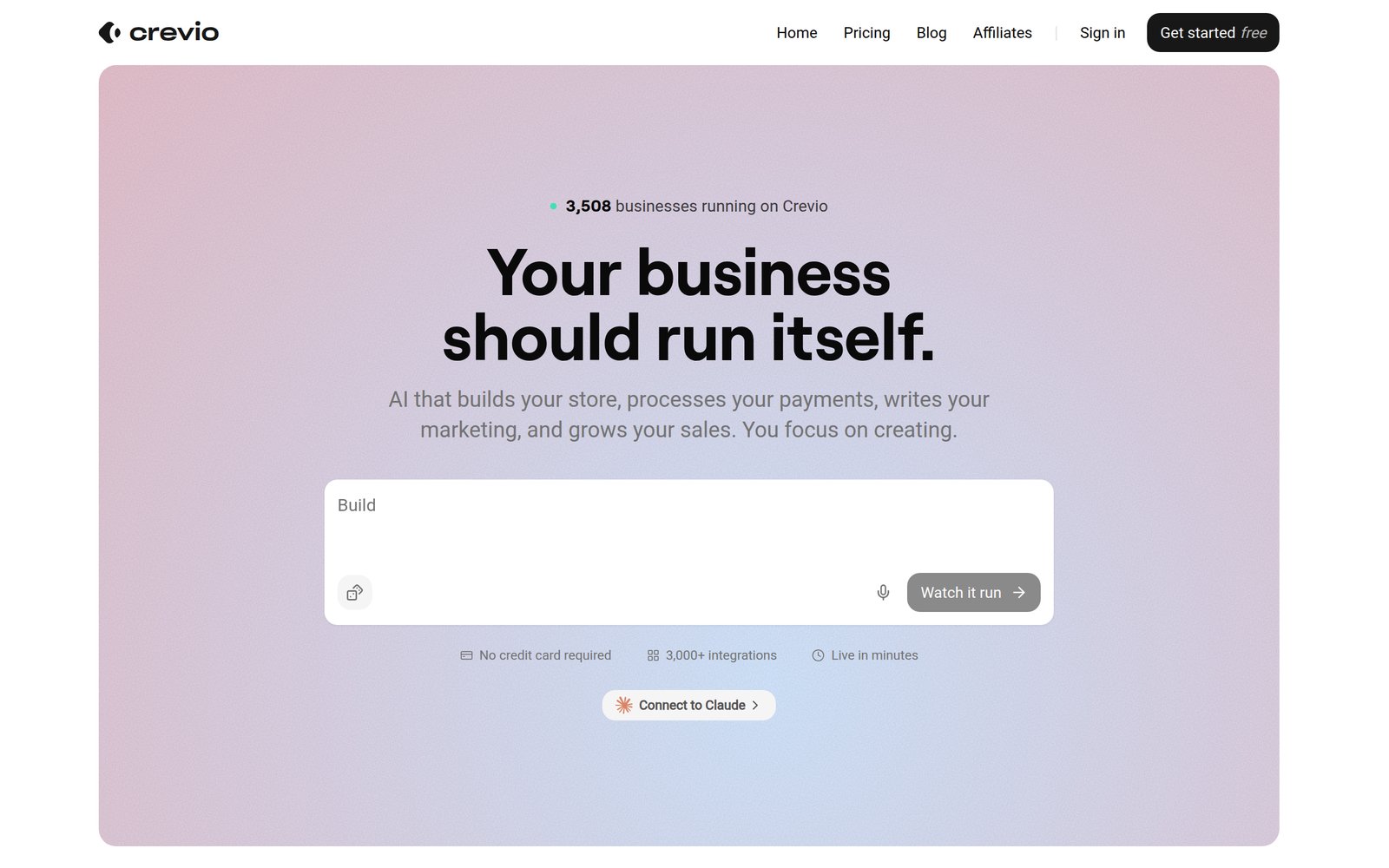 Crevio homepage with the headline Your business should run itself and a prompt box for describing what to build